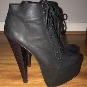 Black tie up heel boots